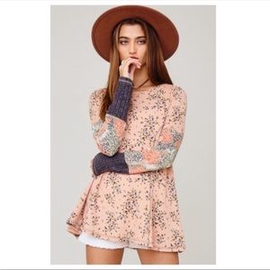 Trendy Floral Tunic Top with solid and animal print details.  Size: S & M